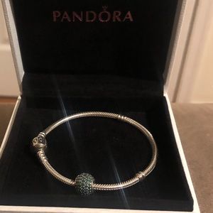 Silver Pandora bracelet & green rhinestone charm